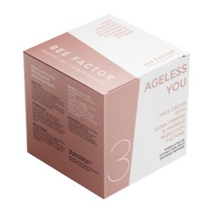 Roze-witte doos van Bee Factor AGELESS YOU-gezichtscrème, schuin van voren gefotografeerd.