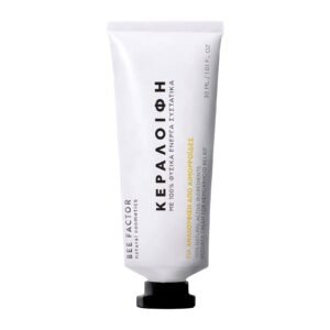 Witte tube Bee Factor bijenwasbalsem met zwart-gele opdruk en zwarte dop, 30 ml.