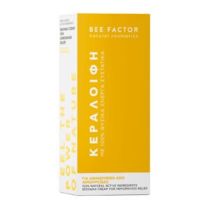 Geel-witte verpakking van Bee Factor bijenwasbalsem met blauwe kamille op een witte achtergrond.