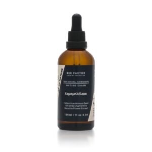 Bruine druppelflacon Bee Factor kamilleolie met zwart etiket, 100 ml.