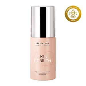 Roze flacon Bee Factor Skin Rebirth-gezichtsserum met zilverkleurige dop.