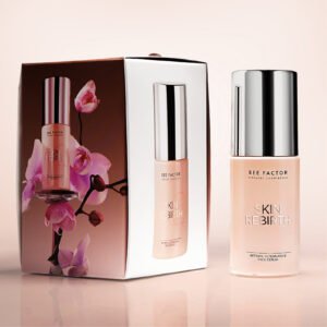 Roze flacon van Bee Factor Skin Rebirth-gezichtsserum naast een doos met orchideeën.