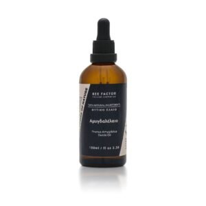 Bruine druppelflacon Bee Factor zoete amandelolie met zwart etiket, 100 ml.
